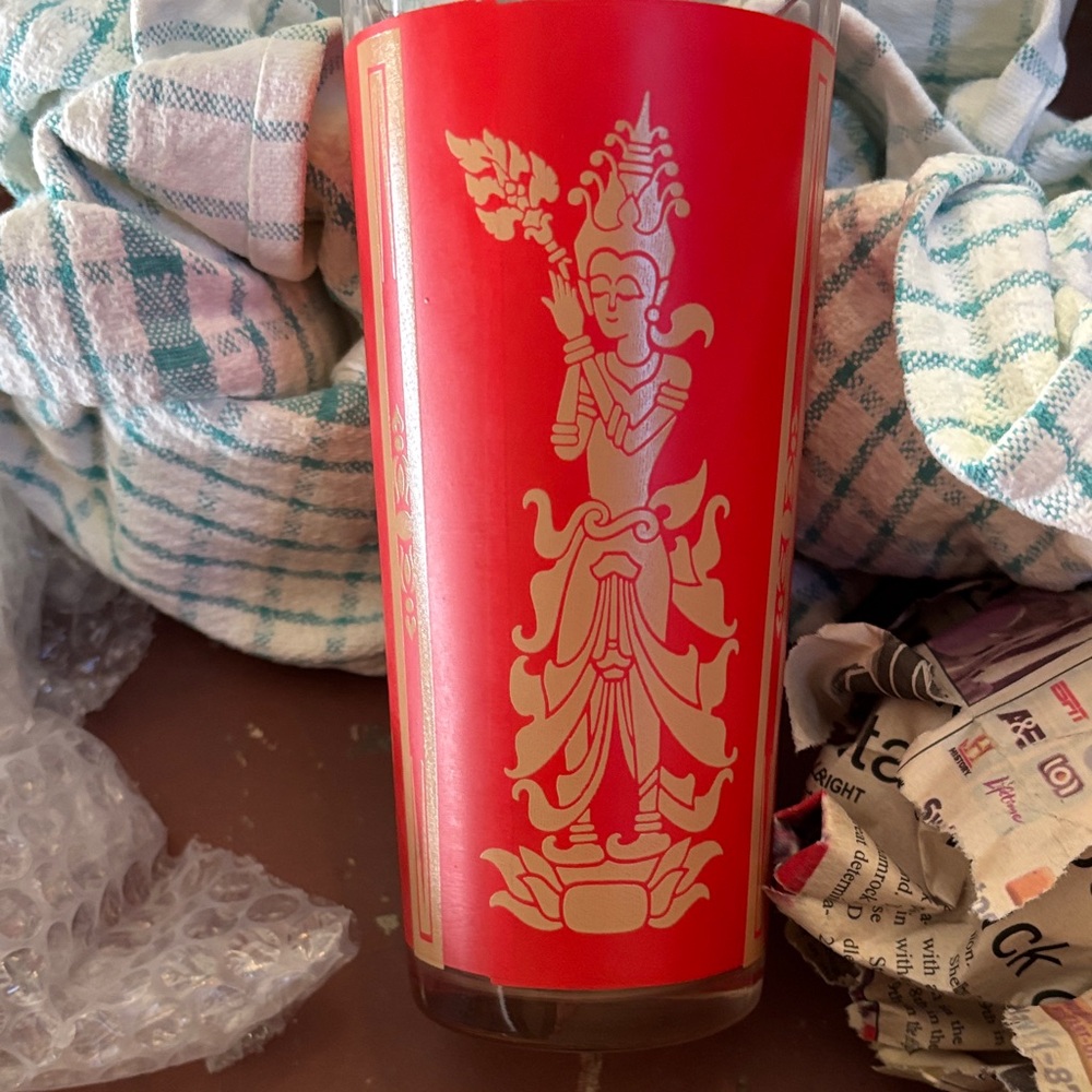 Artistic Red Glass Tumbler with Intricate Design